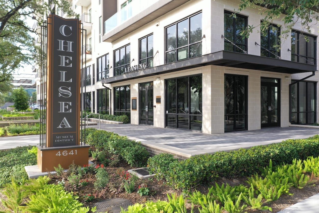 Welcome sign for a client residential apartment complex.