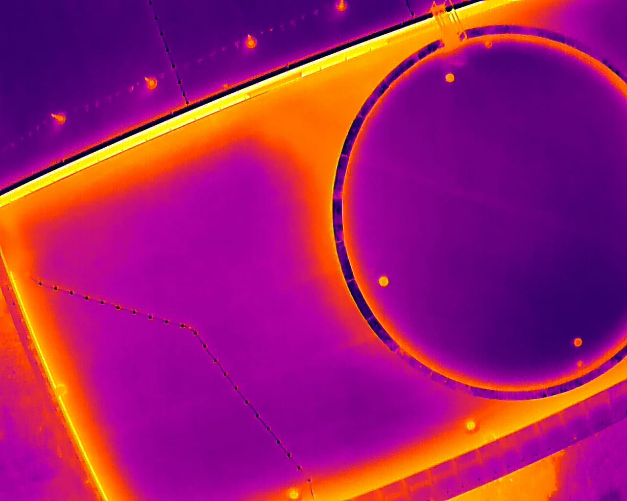 A thermal drone flyover of a commercial roof.