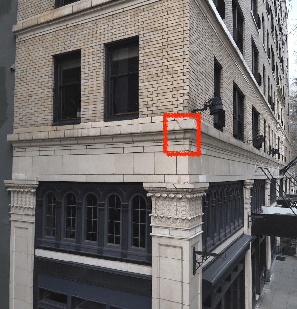 A highlighted building facade issue.