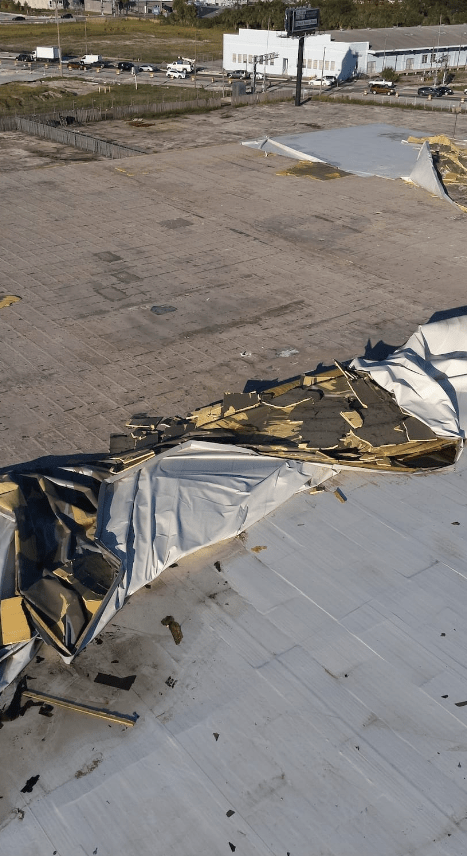 A highly damaged roof with an insurance claim.