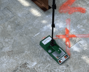 A moisture meter on a roof.