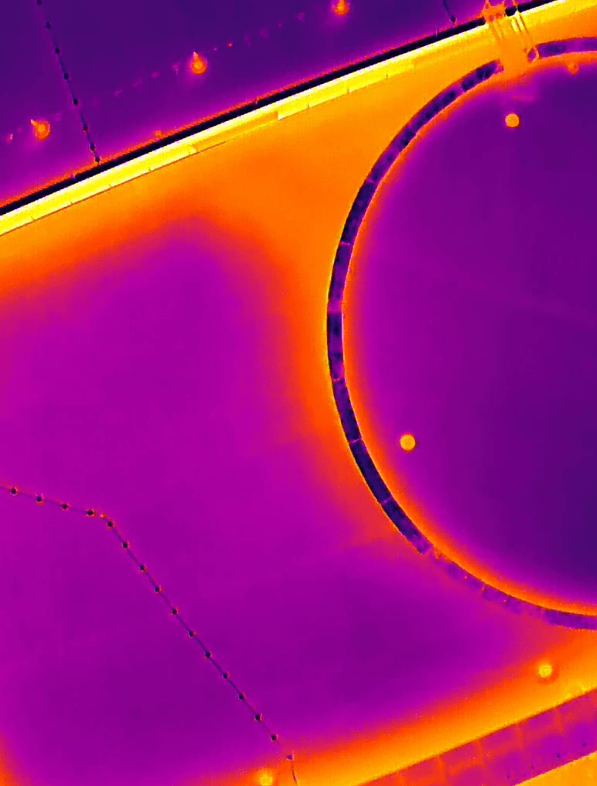 A thermal drone flyover of a commercial roof.