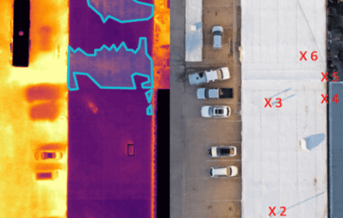 A thermal image and moisture scan of the same industrial building.
