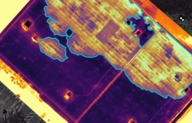 An aerial visual and thermal stitched image with moisture content highlights.
