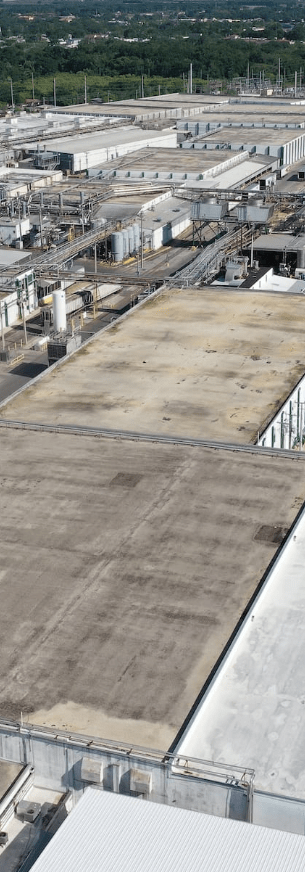 An older industrial roof that requires building consulting services.