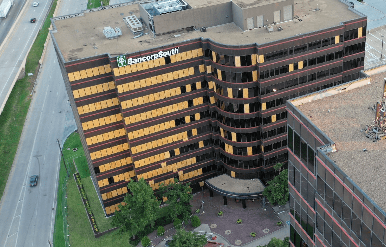 Tornado damage on a commercial real estate building.